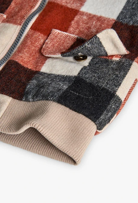 Knitted boy´s jacket with checks