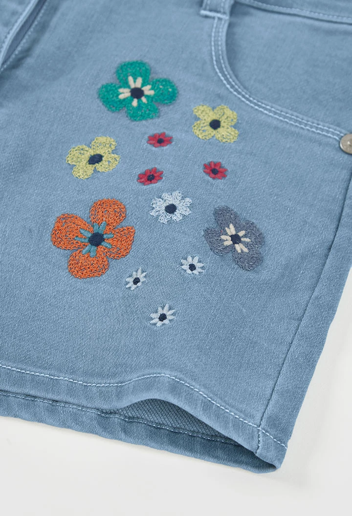 Short in denim con fiori