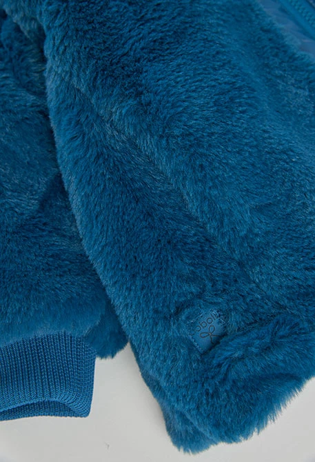 Parka reversible tejido técnico niña azul petróleo