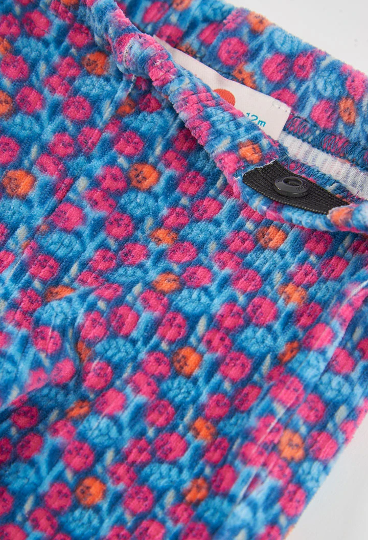 Pantalón niña estampado flores azul acampanado