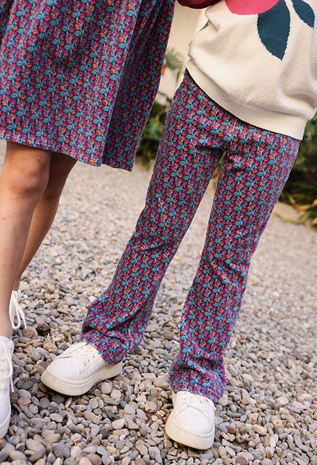 Pantalón niña estampado flores azul acampanado
