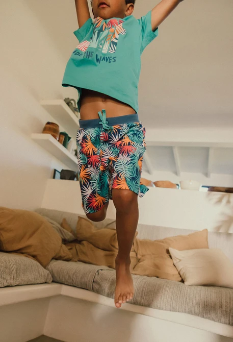 Bermuda a maglia per neonato con stampa tropicale