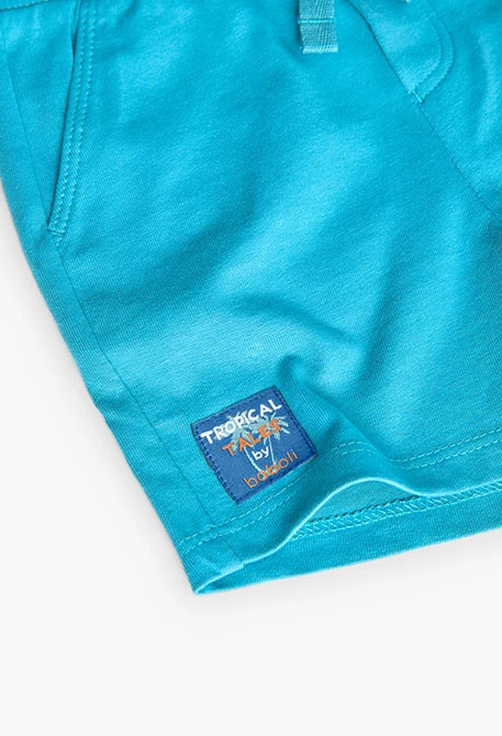 Conjunto de punto para bebé niño en color blanco con estampado y pantalón corto en color azul