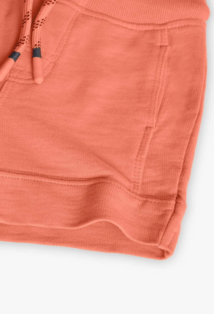 Bermuda a maglia per bambino in colore arancione