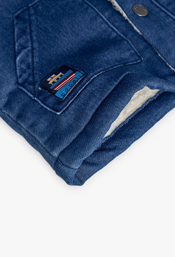 Blue knitted jacket boy boat patch