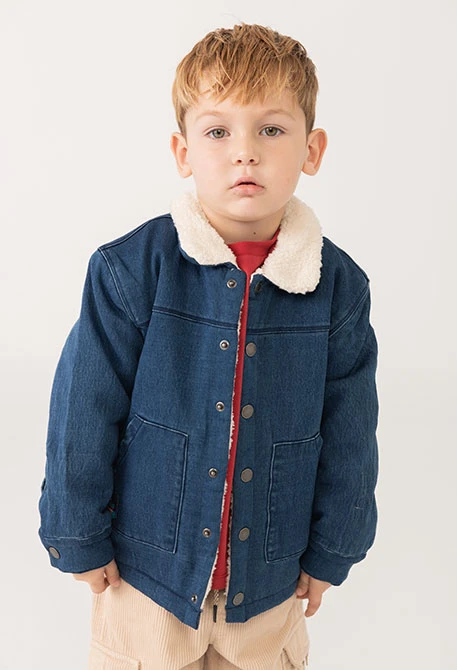 Blue knitted jacket boy boat patch