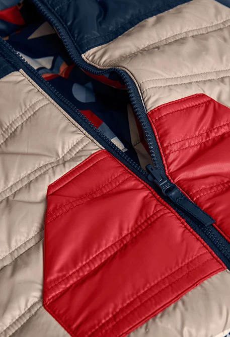 Parka nen teixit tècnic reversible estampat