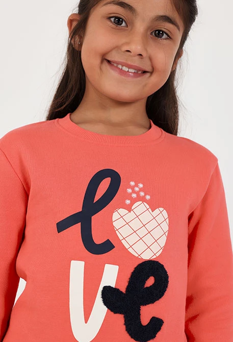 Conjunto punto niña naranja estampado love