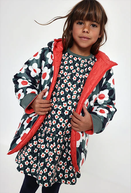 Parka tejido técnico niña naranja estampado flores