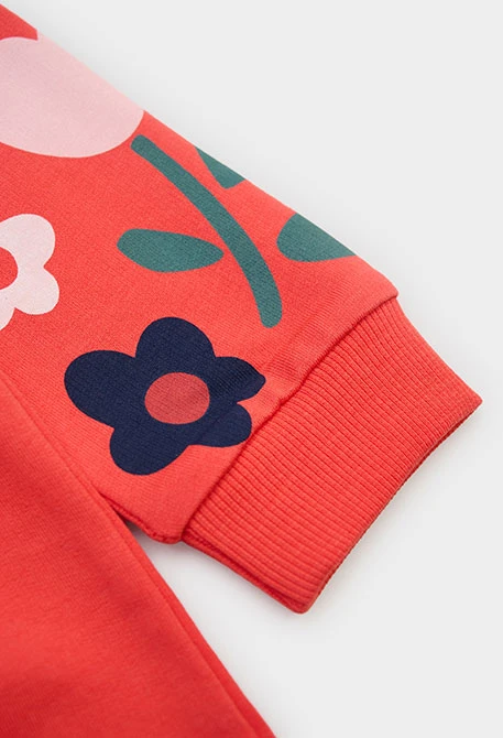 Orangefarbenes Plüschkleid mit Blumendruck