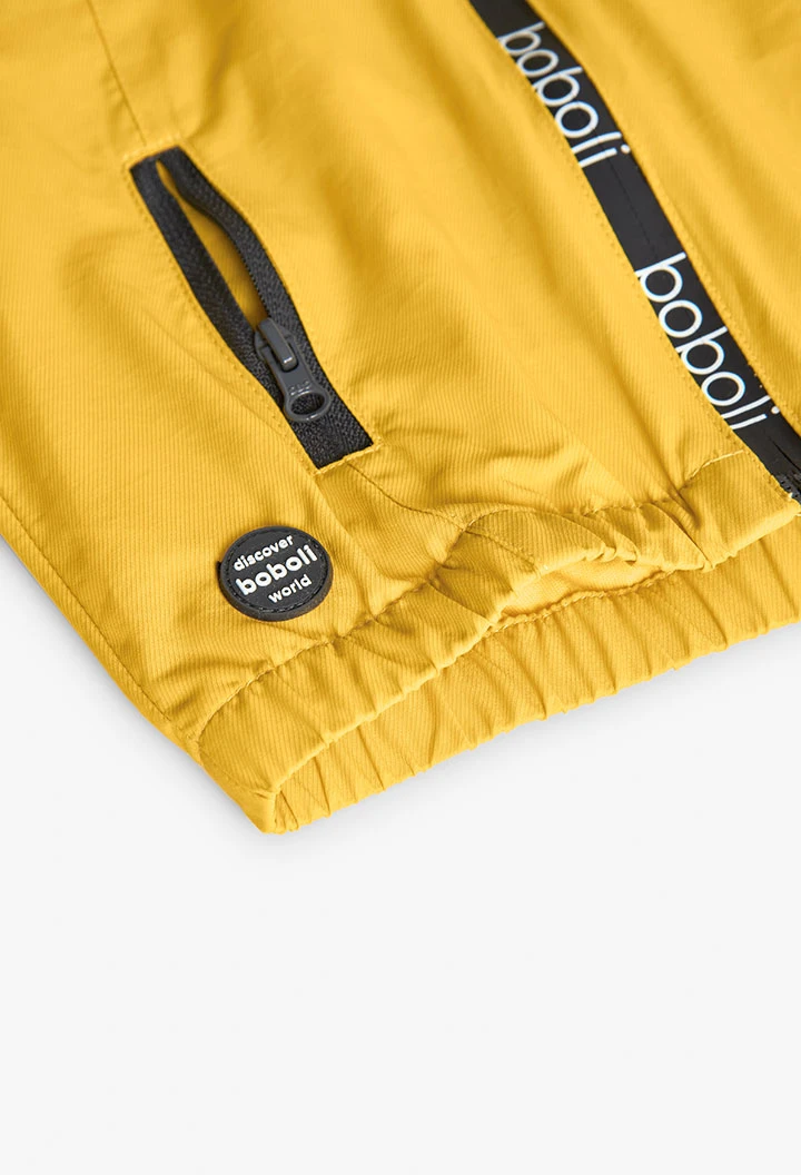 Knitted parka for baby boy in yellow colour