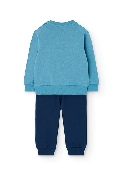 Ensemble garçon polaire paysage montagneux vert