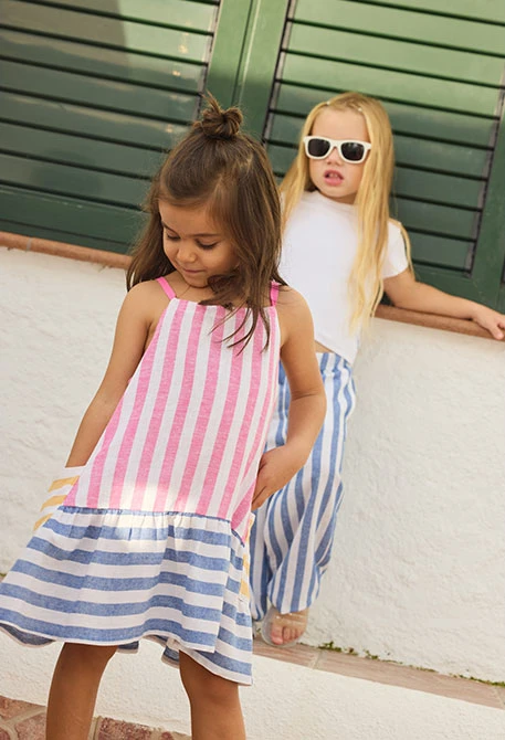 Blusa lunga in lino a righe per bambina