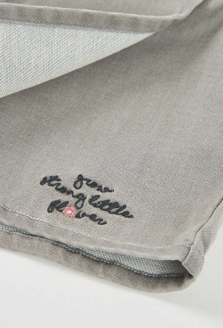 Grey denim skort with embroidery