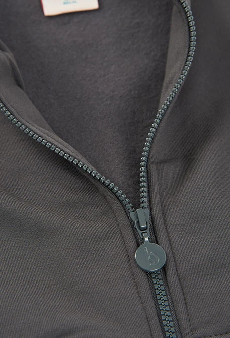 Chaqueta felpa niña gris con volantes