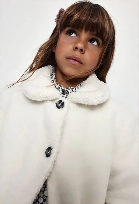 Girl\'s white shearling coat
