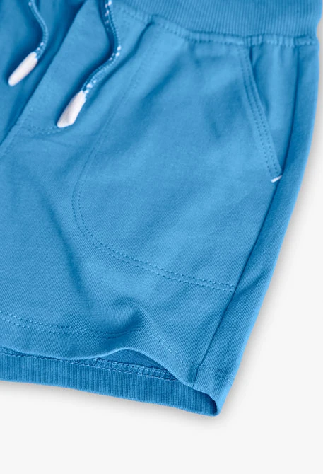 Basic knit bermuda shorts for baby boy in blue.