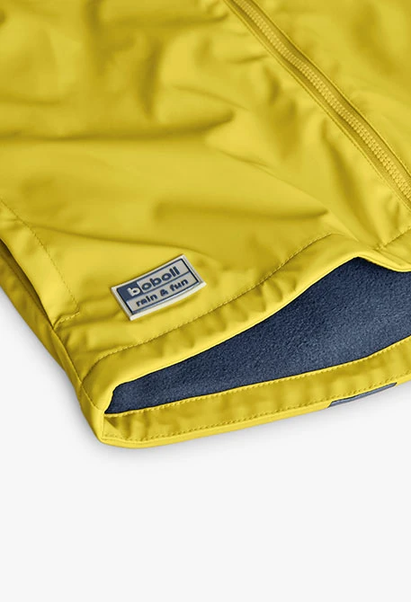 Impermeable amb capell groc