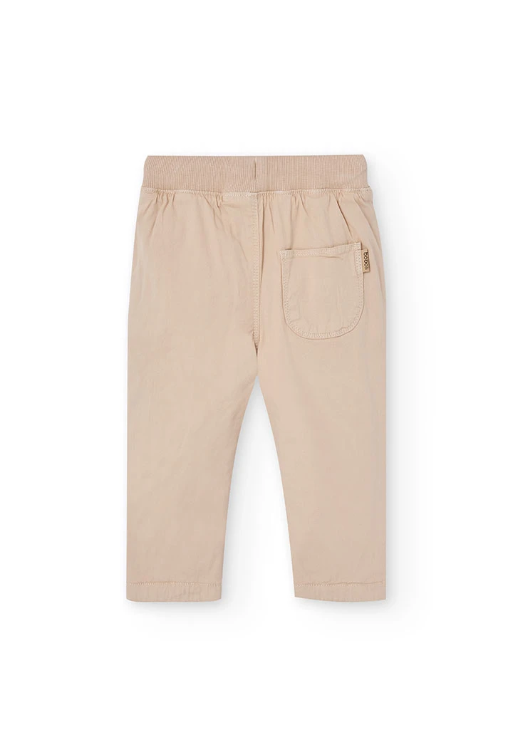 Pantalon garçon beige en coton élastique