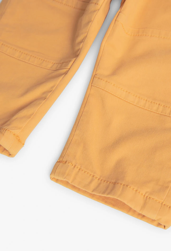 Basic elastic trousers for baby boy in yellow