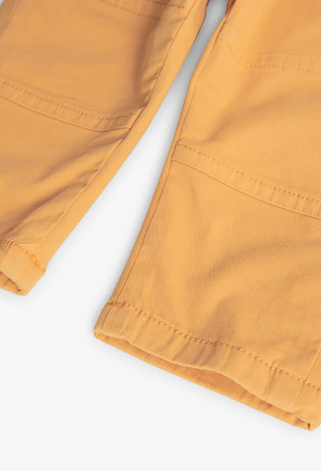 Pantalone basico elastico per neonato maschio in giallo