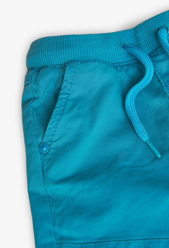 Basic elastic trousers for baby boy in green