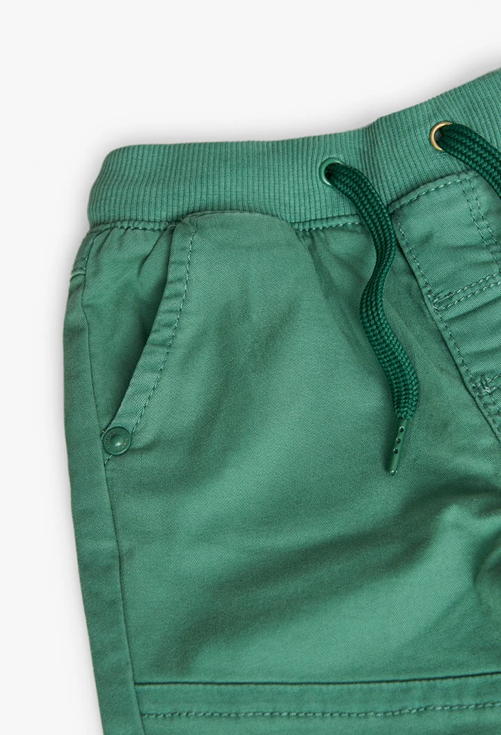 Basic elastic trousers for baby boy in green