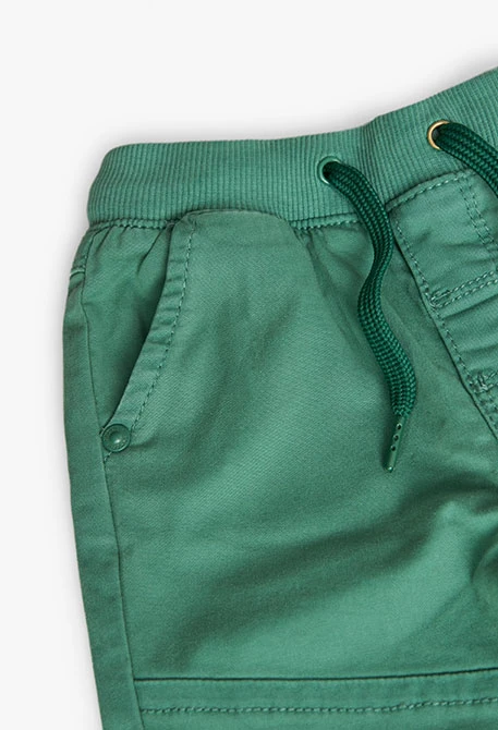 Basic elastic trousers for baby boy in green