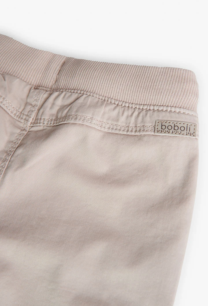 Pantalón básico elástico para bebé niño en beige