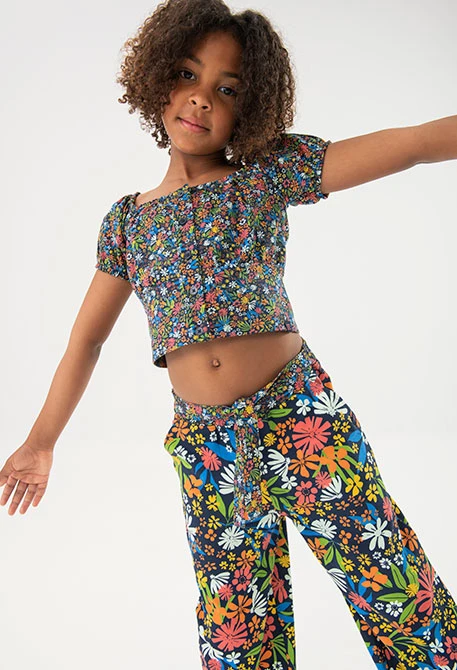 Calça de malha elástica para menina com estampado de flores