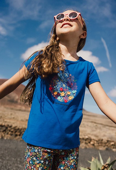 Maglietta a maglia per bambina di colore blu.