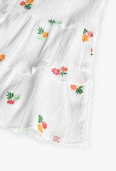 Top de bambula para niña con diseño de flores en color blanco