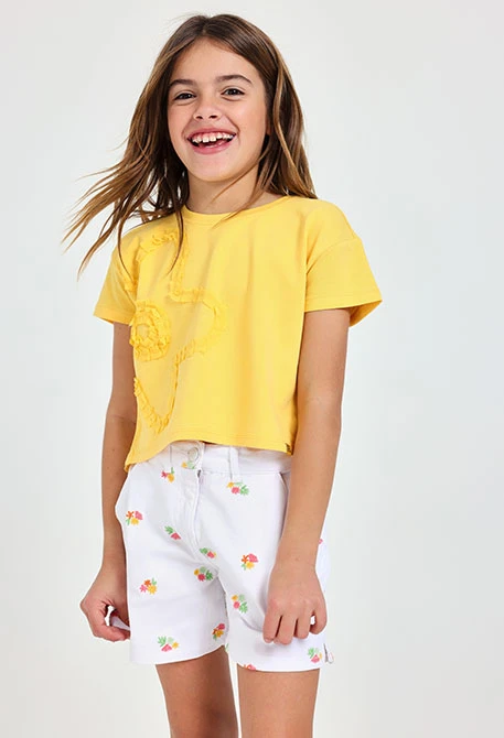 Camiseta de punto para niña en color amarillo