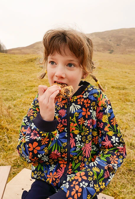 Bomber de punto para niña con estampado de flores