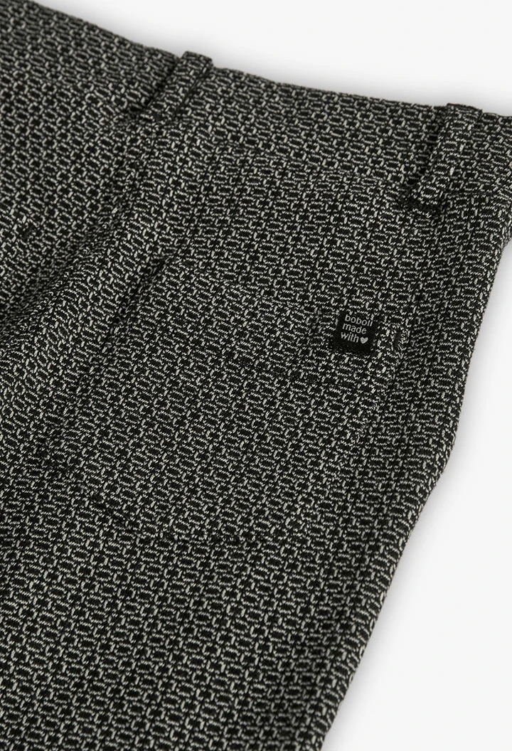 Mädchenhose aus schwarzem geometrischem Strickstoff