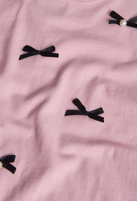Camiseta niña rosa lazos