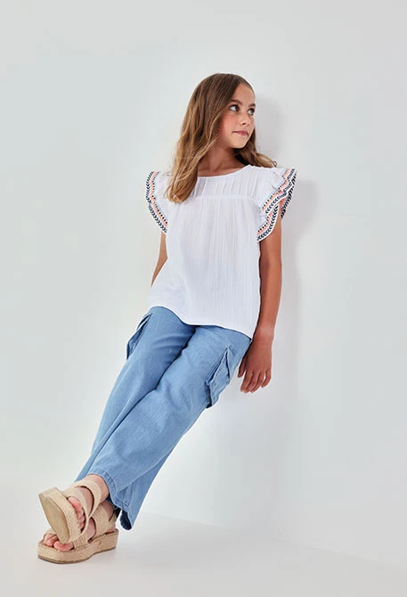 Girl?s bleach colour denim trousers