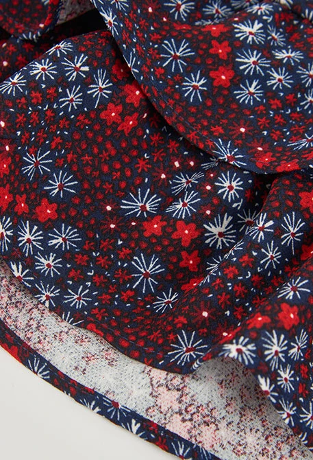 Jupe imprimé fleurs bleu marine à volants