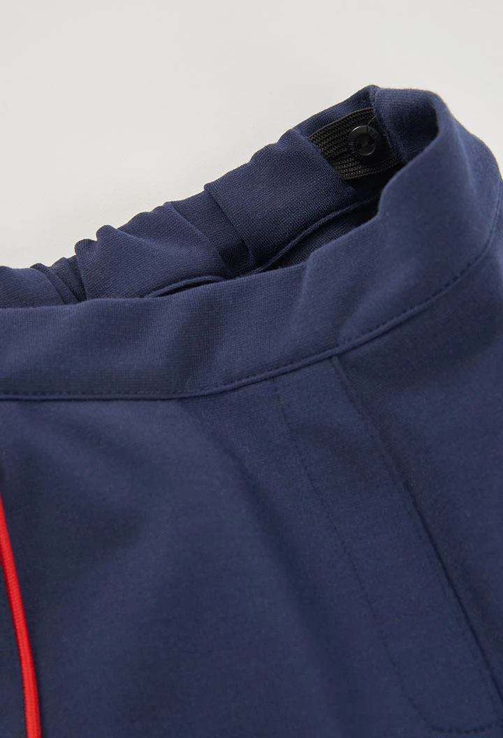 Pantalon fille bleu marine avec bande rouge latérale