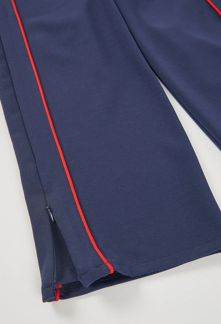 Pantalon fille bleu marine avec bande rouge latérale