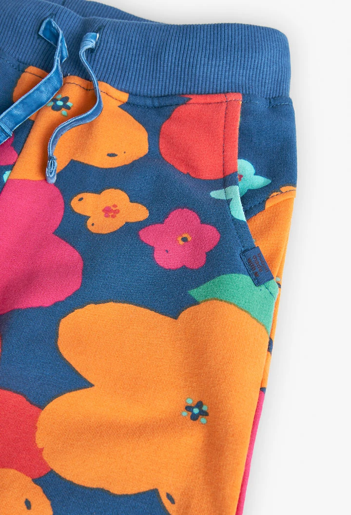 Fleece trousers for girls with a floral print