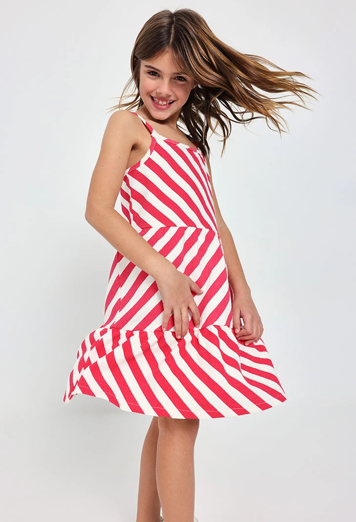 Vestito a maglia per bambina in colore rosso e bianco.