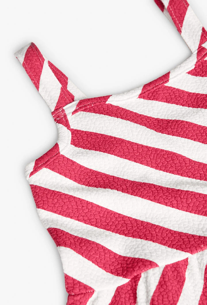 Vestito a maglia per bambina in colore rosso e bianco.