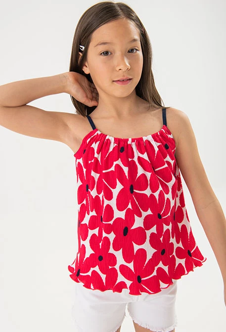 T-shirt en tricot pour fille avec imprimé de fleurs en rouge et blanc.