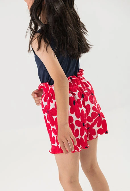 Bermuda in maglia per bambina con stampa di fiori rossi