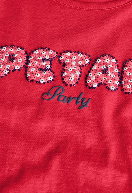 Camiseta de punto flamé para niña en color fresa