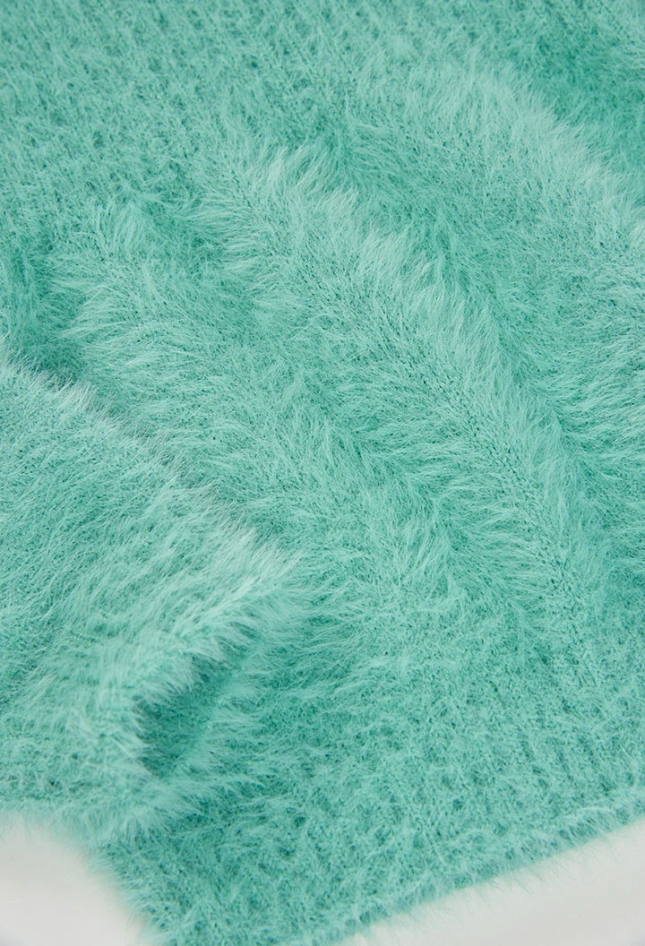 Girl\'s green jumper