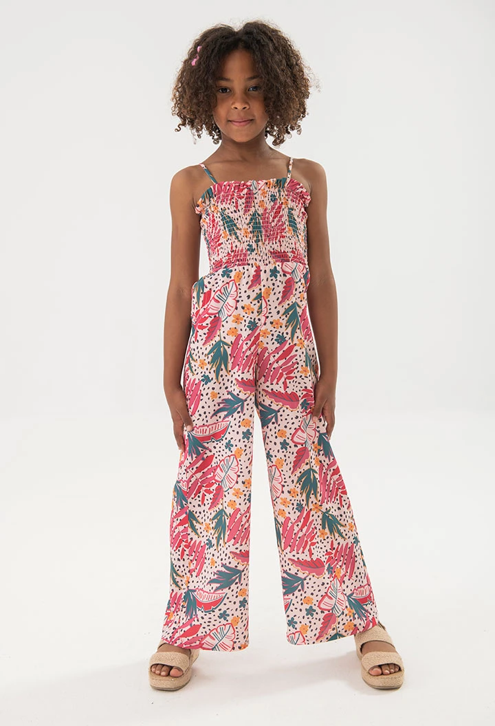 Combinaison en maille pour fille avec imprimé de fleurs et feuilles colorées en rose.