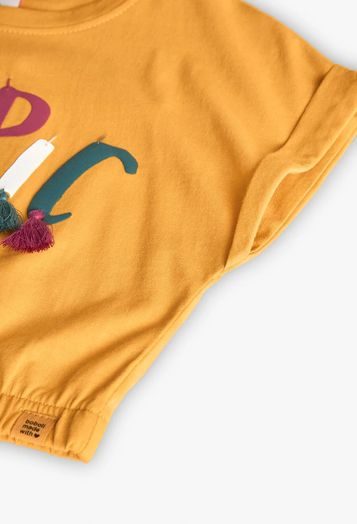 Girl's yellow knitted t-shirt