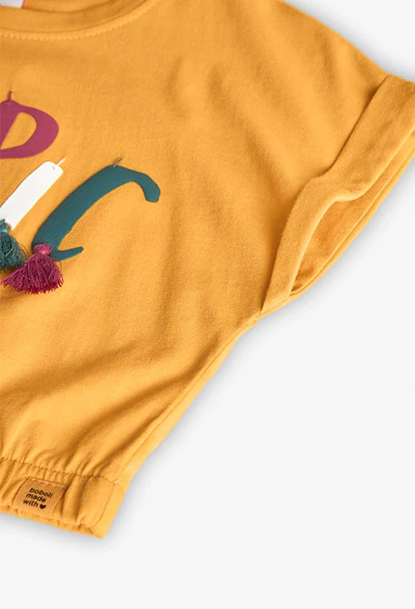 Camiseta de punto para niña en color amarillo